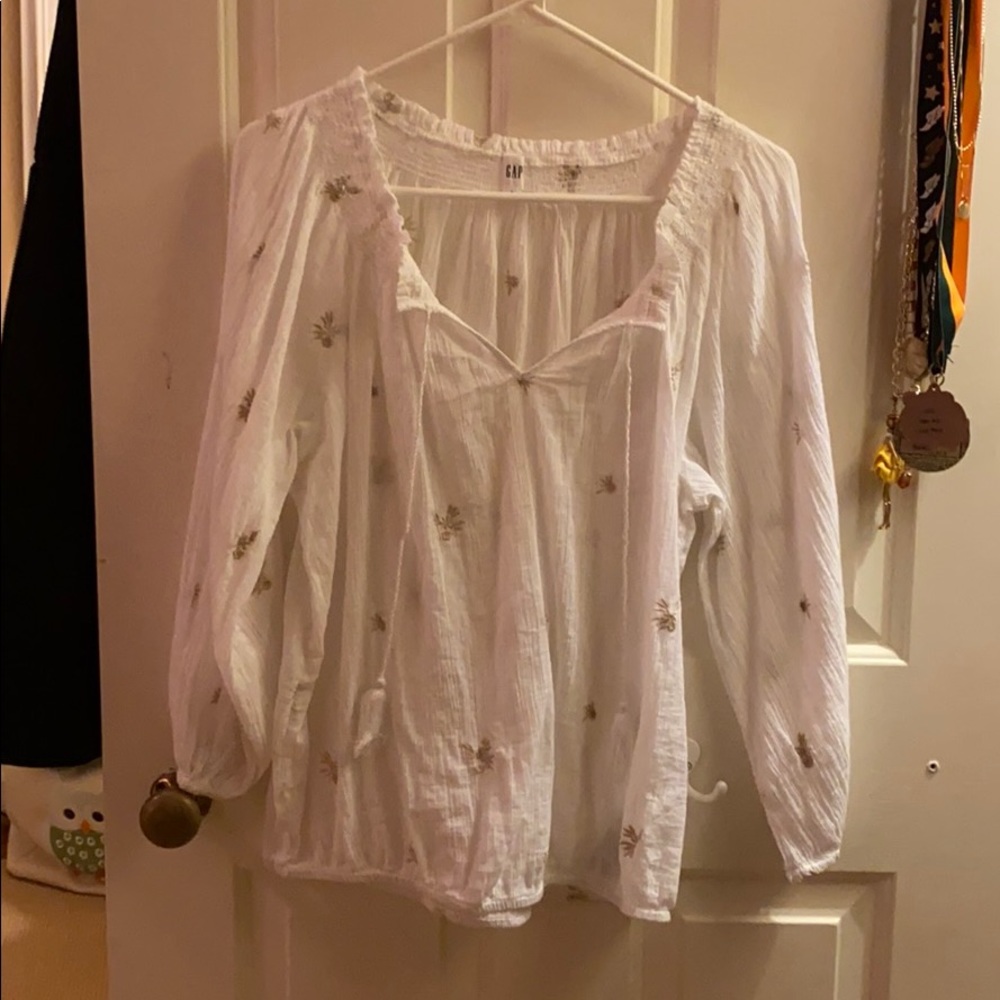 White and gold blouse